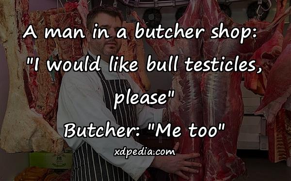 A man in a butcher shop: 