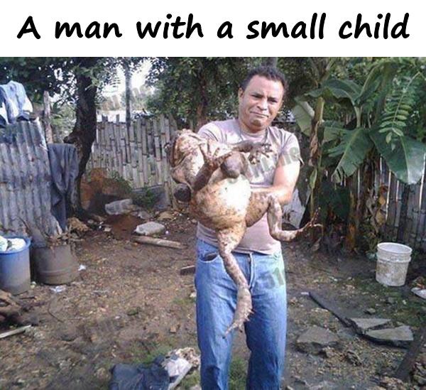 A man with a small child