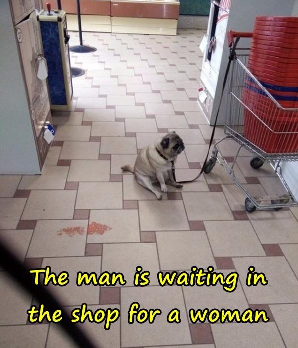 The man is waiting in the shop for a woman